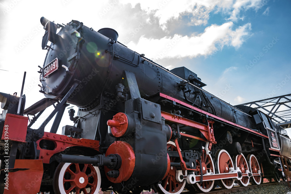 Steam locomotive and blue sky in the background