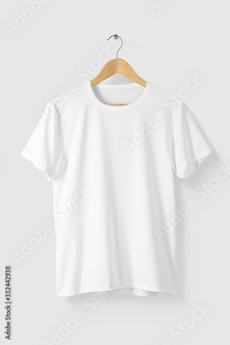 Blank White T-Shirt Mock-up on wooden hanger, front side view. High resolution.
