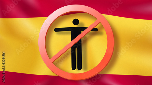 Forbbiden sign with crossed out man on a background Spanish flag. photo