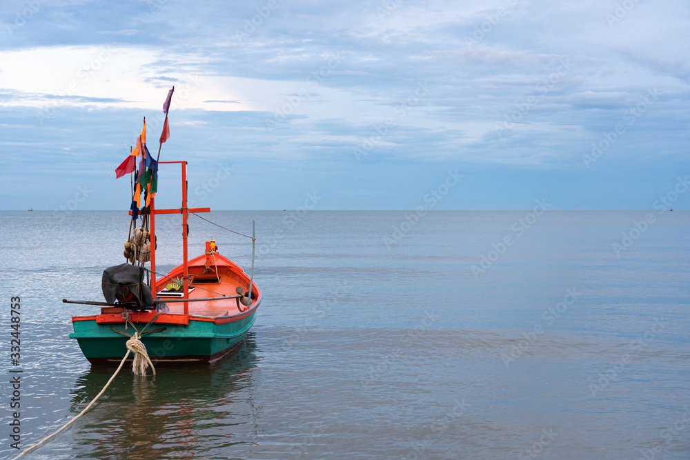 Fishing boat anchored on the seashore