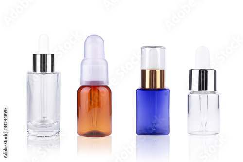 bottles with essential oils isolated on white background