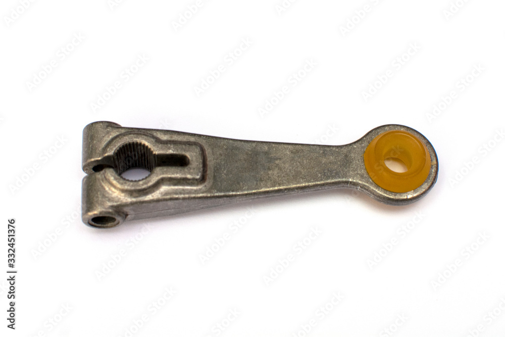 Thrust of the gear selection transmission truck on a white background. Spare parts. Thrust of the gear selection transmission truck on a white background. Spare parts.