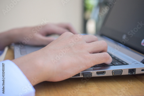 Businessman typing computer working in office