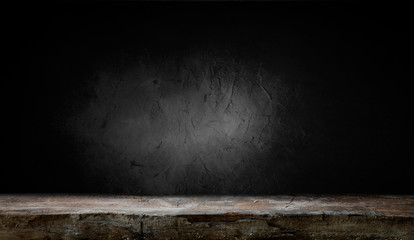 Selected focus empty brown wooden table and wall texture or old black brick wall blur background image. for your photomontage or product display