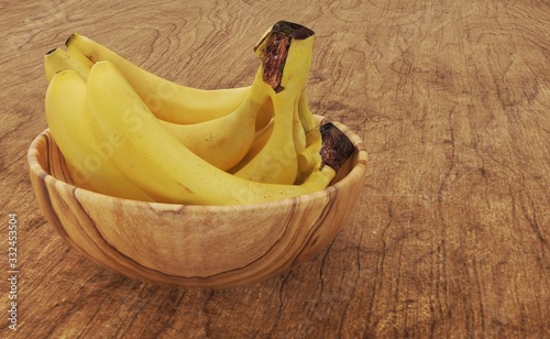 Bananas in a wooden bowl 