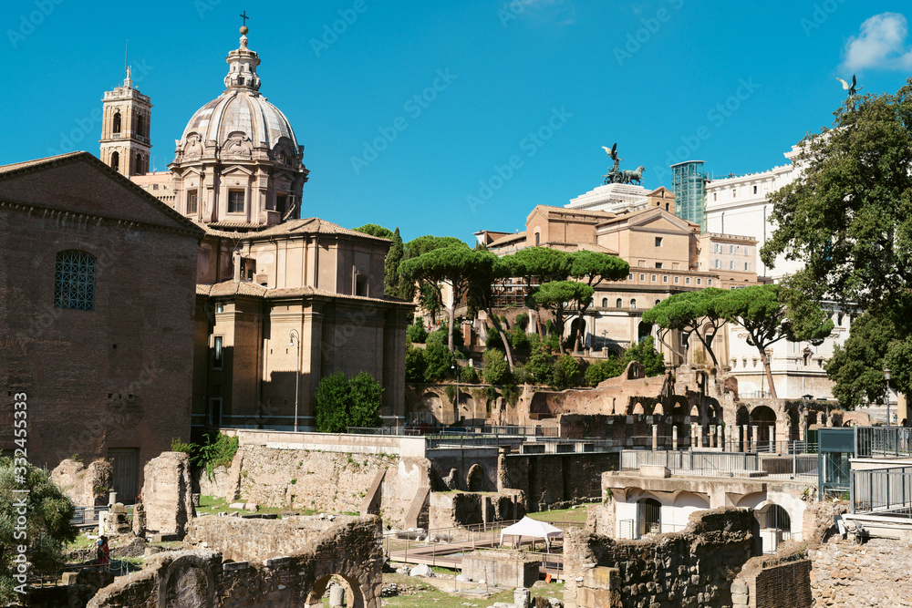 View of the ancient city center of Rome. Ruins, tourist places of Rome, coliseum, Roman forum. The cultural heritage of ancient Italy.