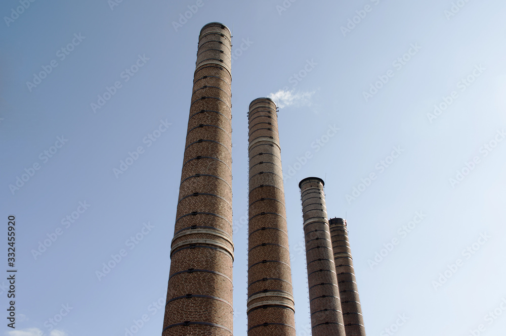 Four old industrial chimneys