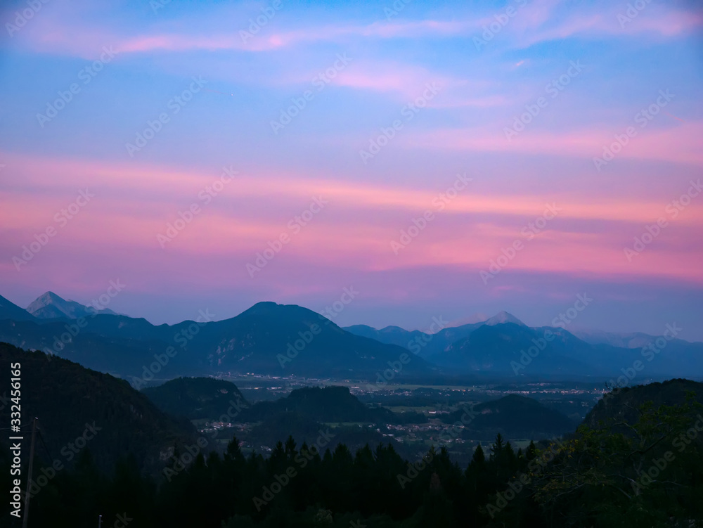 View on the beautiful sunrise over the majestic hills with the Lake Bled in Slovenia