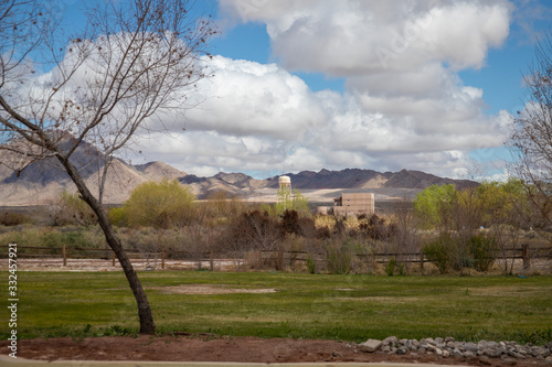 A water tower in the distance of a Las Vegas wetlands area