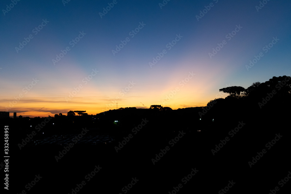 sunset city silhouette