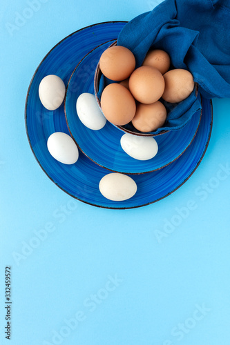 Fresh two color chicken  eggs photo