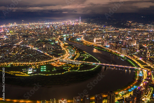 Taipei City Aerial View - Asia business concept image, panoramic modern cityscape building bird’s eye view under at night, shot in Taipei, Taiwan.