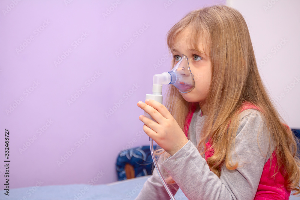 Portrait of sweet little girl using an inhaler, home therapy Portrait of sweet little girl using an inhaler, home therapy