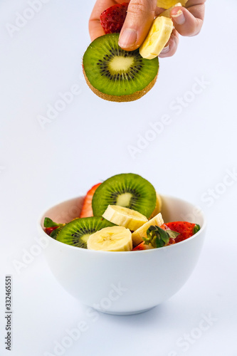 Recipe of a fruit salad with kiwis, strawberries, bananas