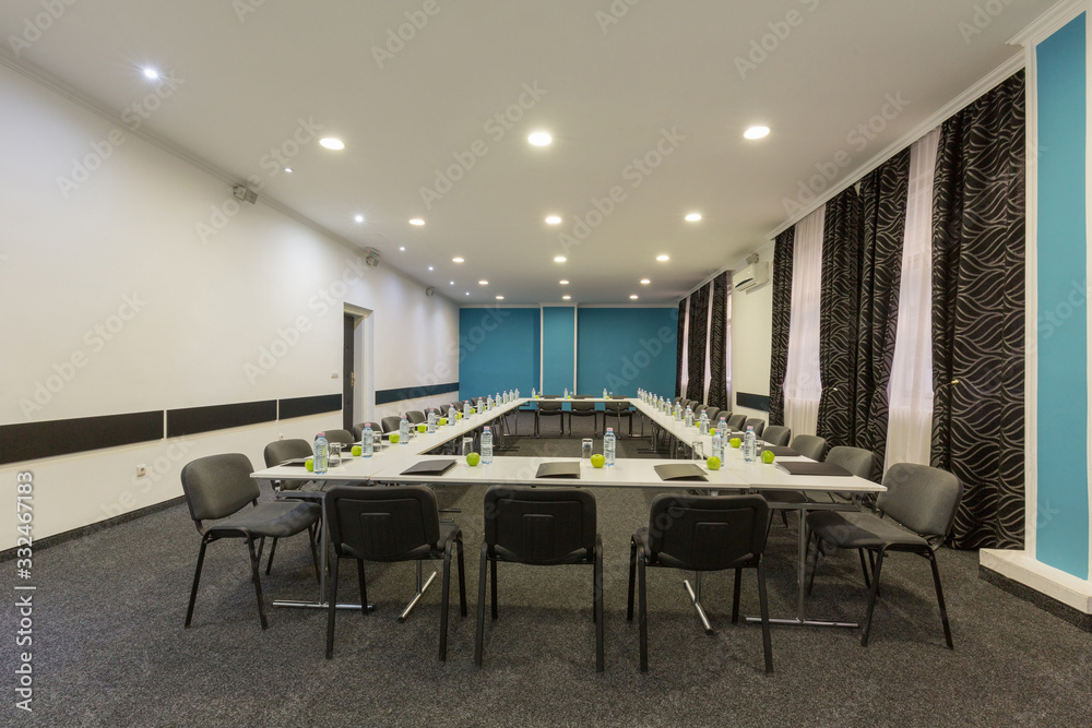 Interior of a conference room in hotel ready for a meeting Interior of a conference room in hotel ready for a meeting