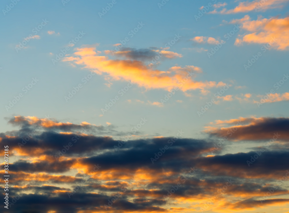 Bottom aligned sunset clouds background