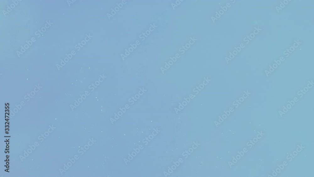 dust particle flowing on color background dust particle flowing on color background