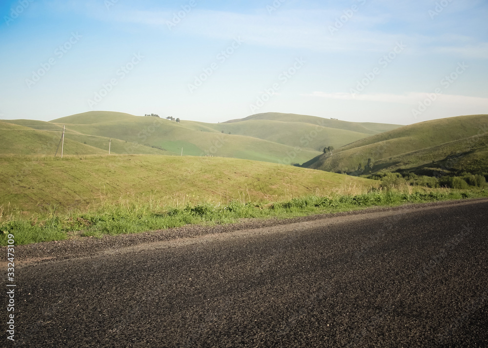 Empty Road and Nature of countryside with green hills