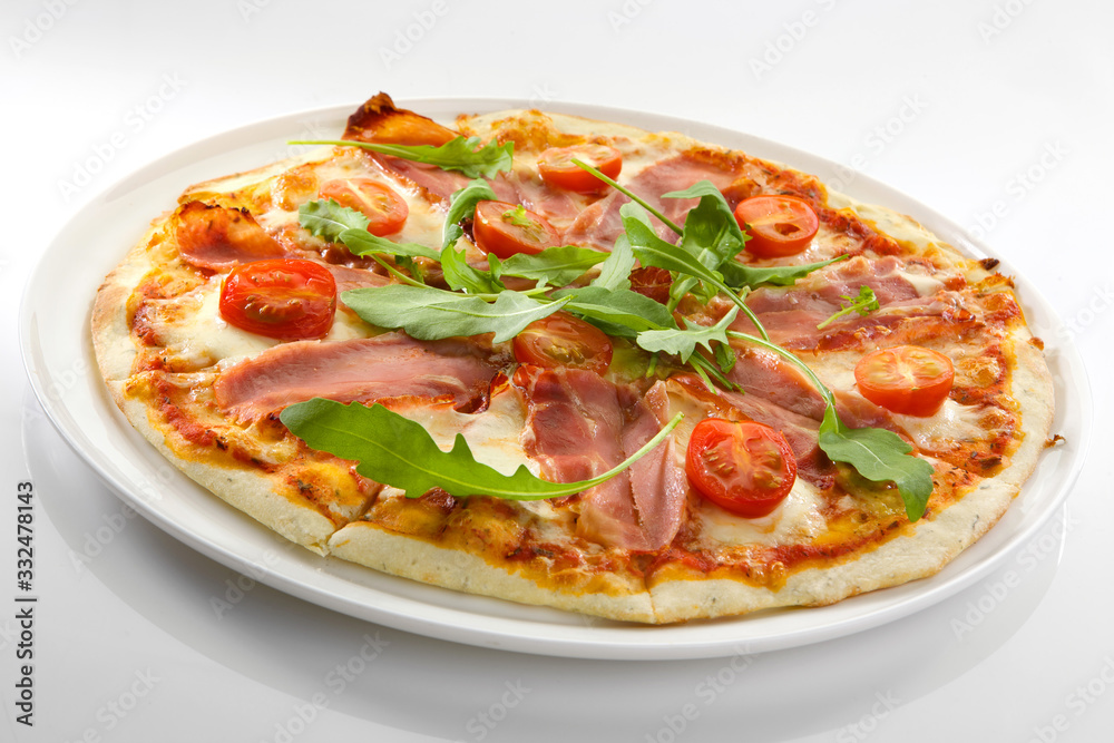 Flatlay of Italian pizza on wooden background. Rustic homemade pizzas with salami, bacon,  cheese, eggs and raw vegetables on shabby wooden background. Healthy vegetarian fungi pizza