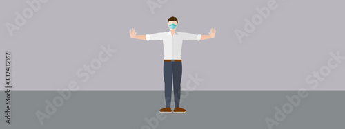 A man stands with arms stretched out to maintain social distancing while wearing a mask for COVID-19 coronavirus prevention