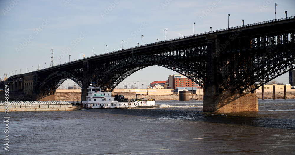 St Louis Missouri Arch Bridge and Railway with River Boat on the Mississippi River    