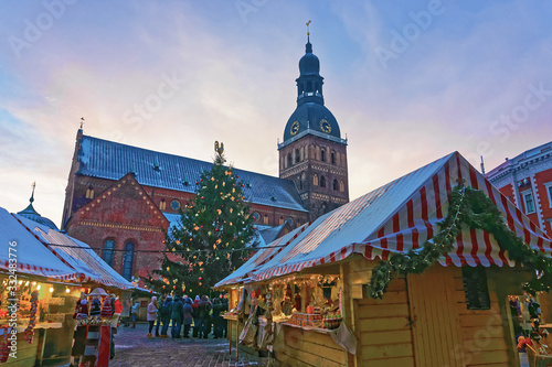 Group of unidentified people Christmas market at Dome square in Old Riga
