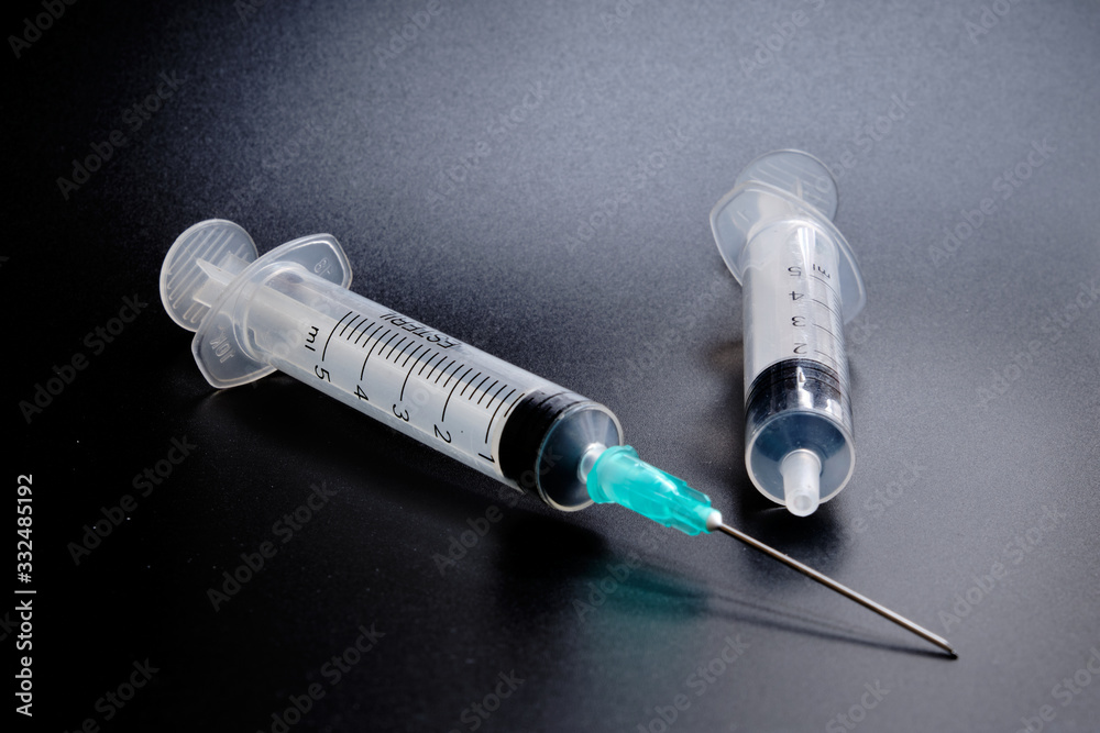 A small syringe into which a hollow, sharp-pointed bevel-cut needle is inserted and is used to inject medicinal substances into tissues or organs. A small syringe into which a hollow, sharp-pointed bevel-cut needle is inserted and is used to inject medicinal substances into tissues or organs.