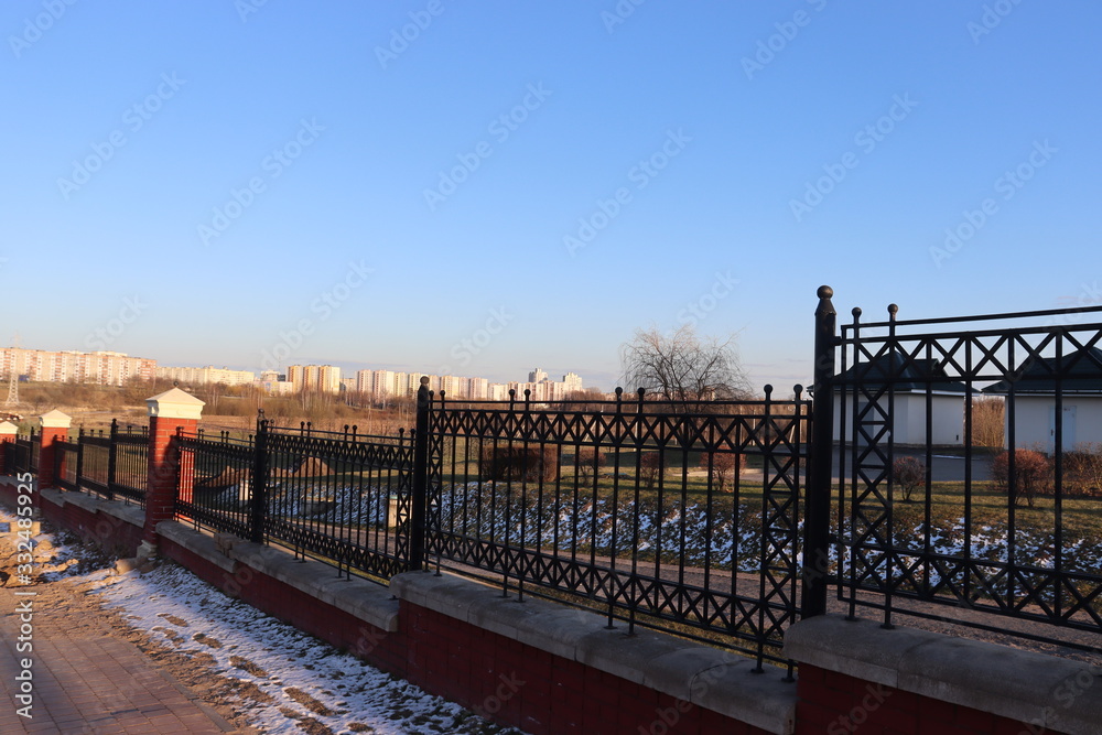 park fence with brick posts