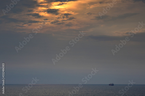 Dawn at the sea. Sea coast, stones. Black Sea.
