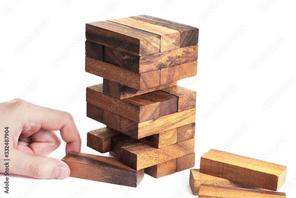 Jenga game on a white background. Entertainment Jenga game on a white background. Entertainment
