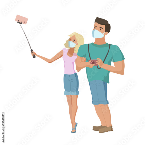 Young couple in medical masks make selfie