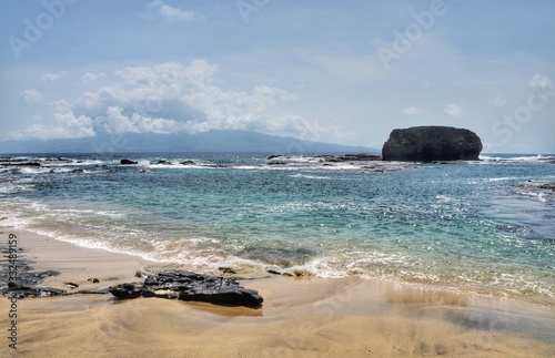 White sand beach on the islet of djeu photo