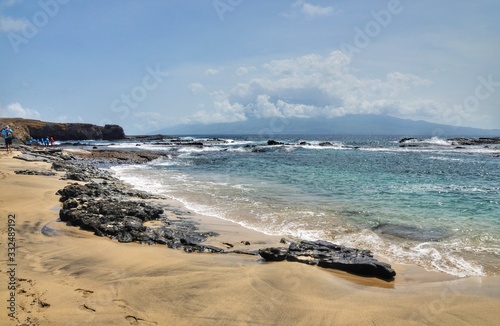 Dock formation on a white sand beach in Cabo Verde photo