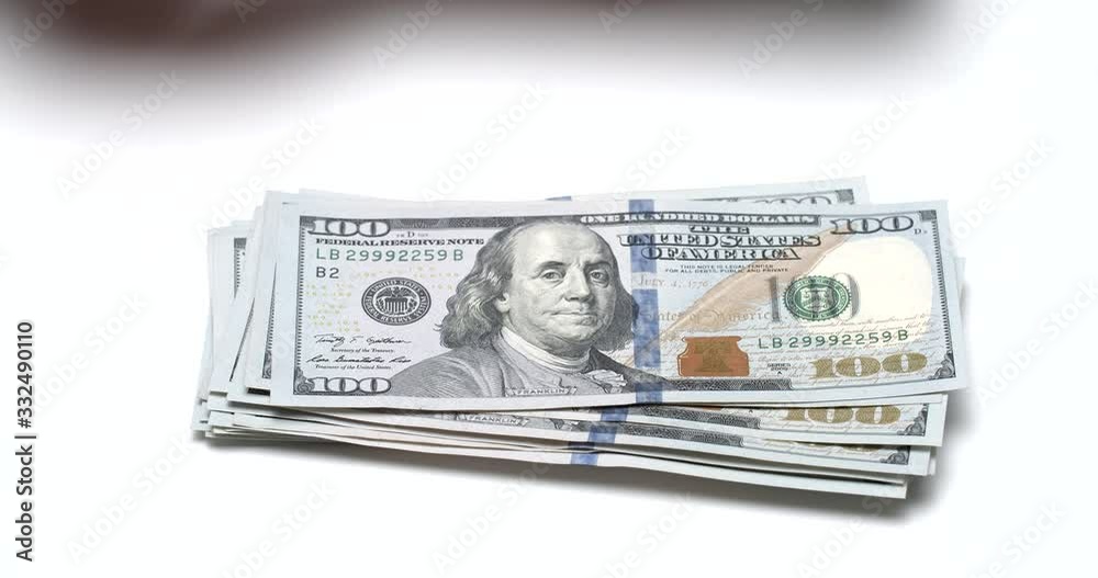 Person counting one hundred dollar banknotes, cash salary, timelapse