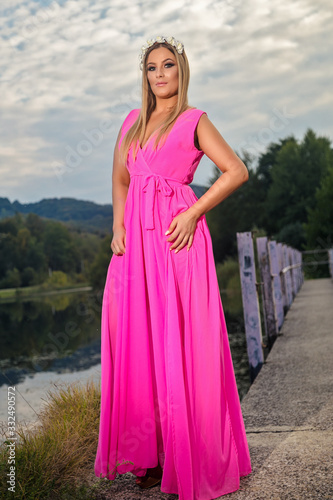 Beautiful blonde by the lake