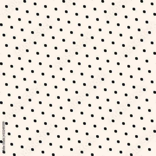 Polka dot seamless pattern. Simple minimalist black and white background. Vector monochrome subtle texture with tiny diagonal spots, dots, ovate shapes. Abstract minimal design for decor, wrapping