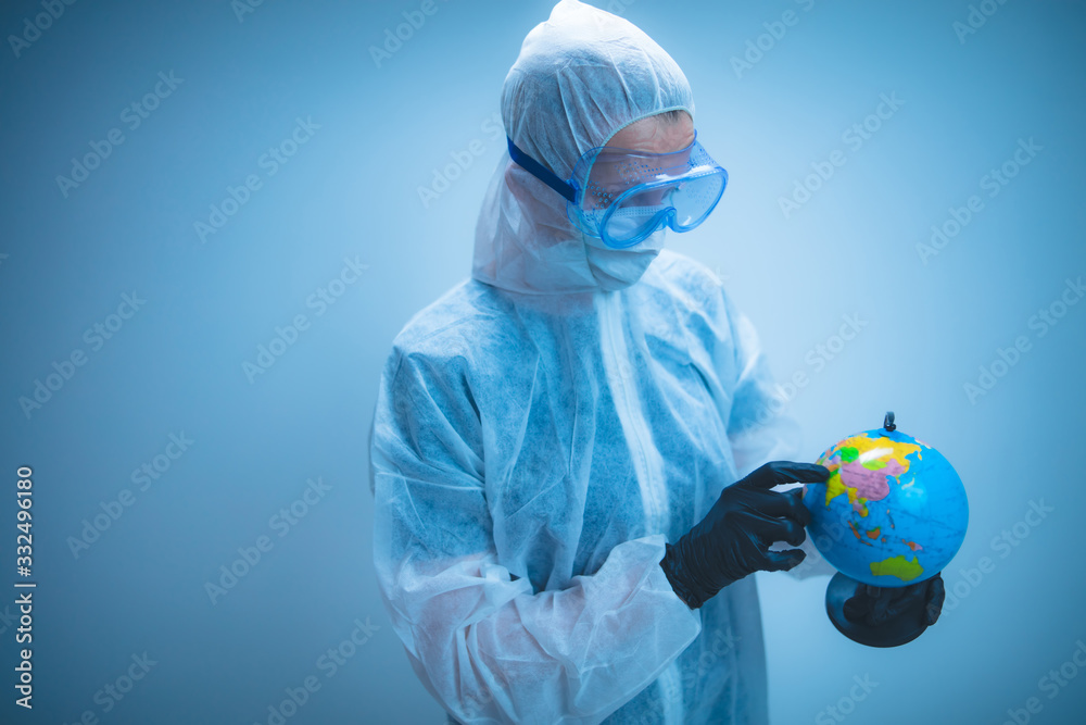 Medical doctor and scientist holding Earth globe for presenting virus pandemic outbreak on the whole planet. Medical doctor and scientist holding Earth globe for presenting virus pandemic outbreak on the whole planet.