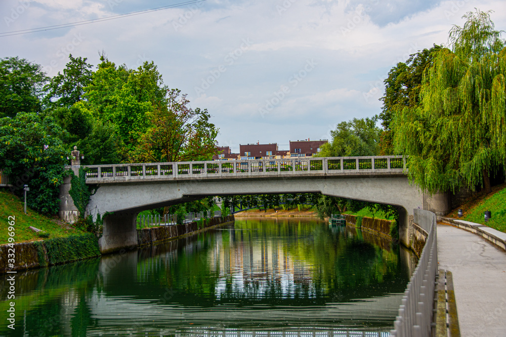 View to the bridge ove the river Ljubljanica in city of Ljubljana in Slovenia