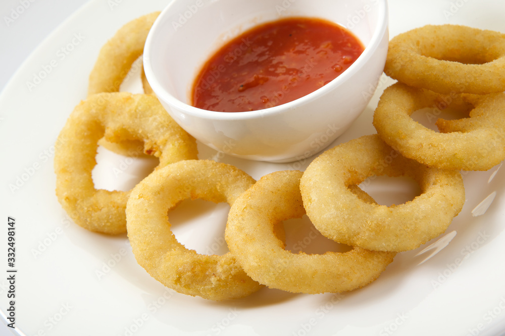 Appetizing Thick Cut Onion Rings isolated on white background Appetizing Thick Cut Onion Rings isolated on white background