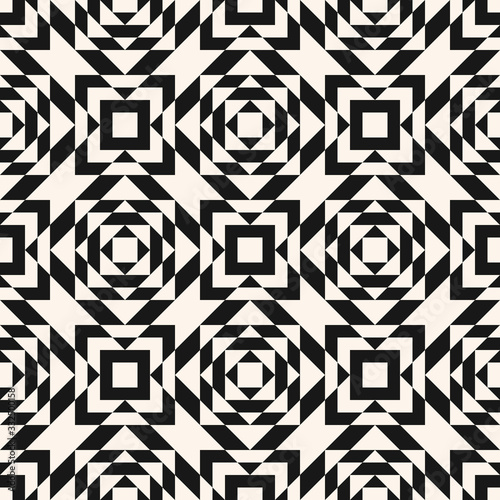 Vector geometric seamless pattern in traditional style. Tribal ethnic motif. Ornament with squares, triangles, rhombuses, grid. Abstract black and white texture. Monochrome repeat background. Op art