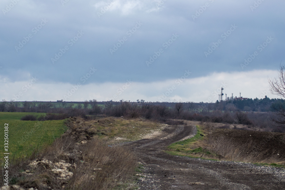Dirt road near the agricultural field, nature concept, outdoors, path in the nature
