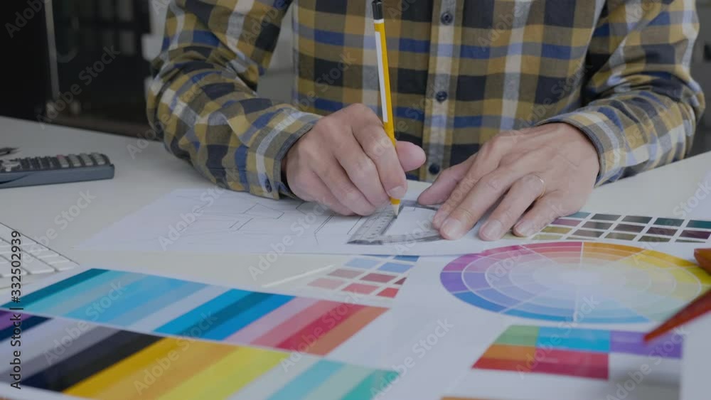 Architects and designers Palette of colors designs drawing on blueprint using rulers for working and multitasking in the office Home interior decoration and renovation planning concept Architects and designers Palette of colors designs drawing on blueprint using rulers for working and multitasking in the office Home interior decoration and renovation planning concept