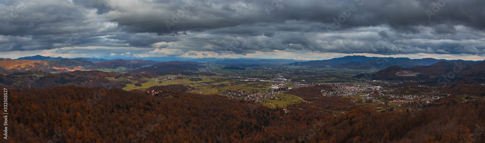 Panoramic view over the basin of Ljubljana or Ljubljanska kotlina as seen from the hill of Ulovka or Planina above Vrhnika on a cloudy autumn day.