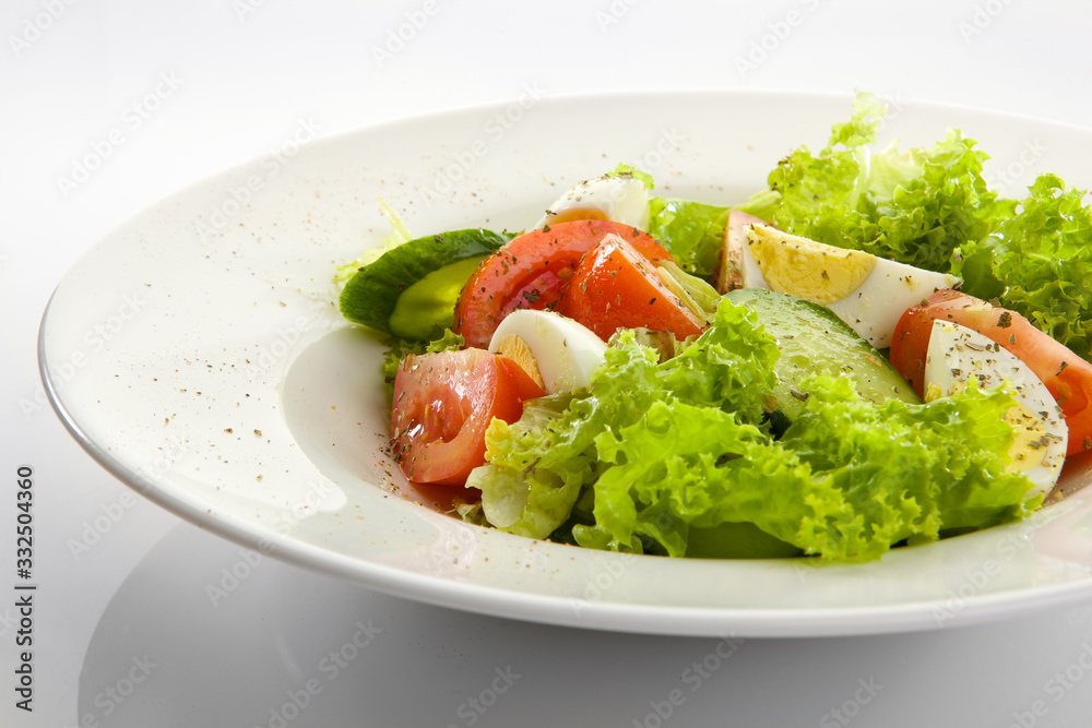 Appetizing salad isolated on white background Appetizing salad isolated on white background