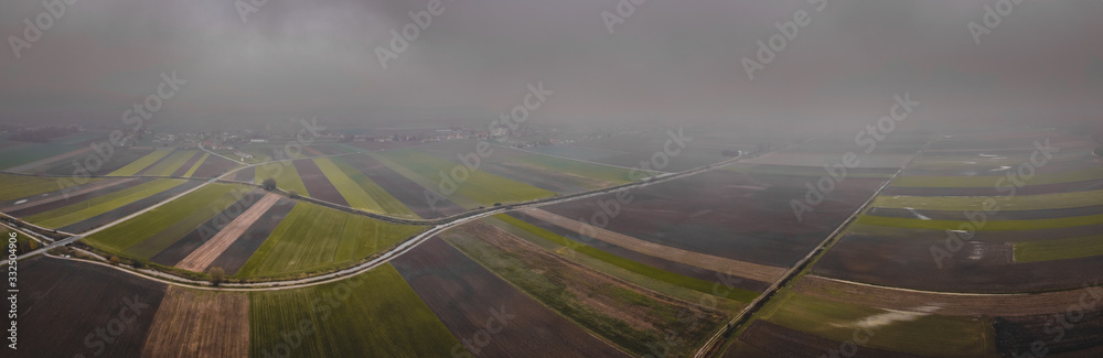 Wet agricultural fields from high perspective.