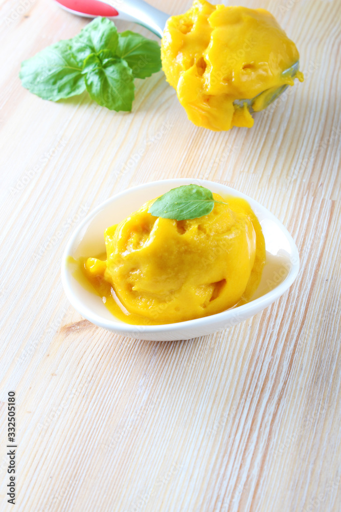 mango sorbet on a light background mango sorbet on a light background