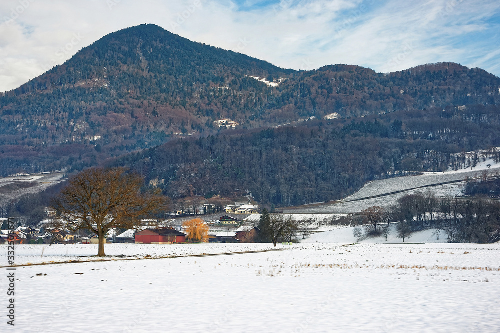 Landscape on countryside in snow covered Switzerland in winter