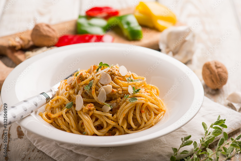 spaghetti with capsicum pest with nuts and almond