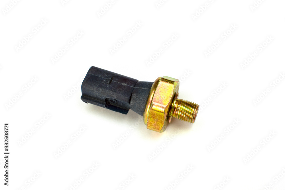 Auto parts oil pressure sensor isolated on white background. Spare parts. Auto parts oil pressure sensor isolated on white background. Spare parts.