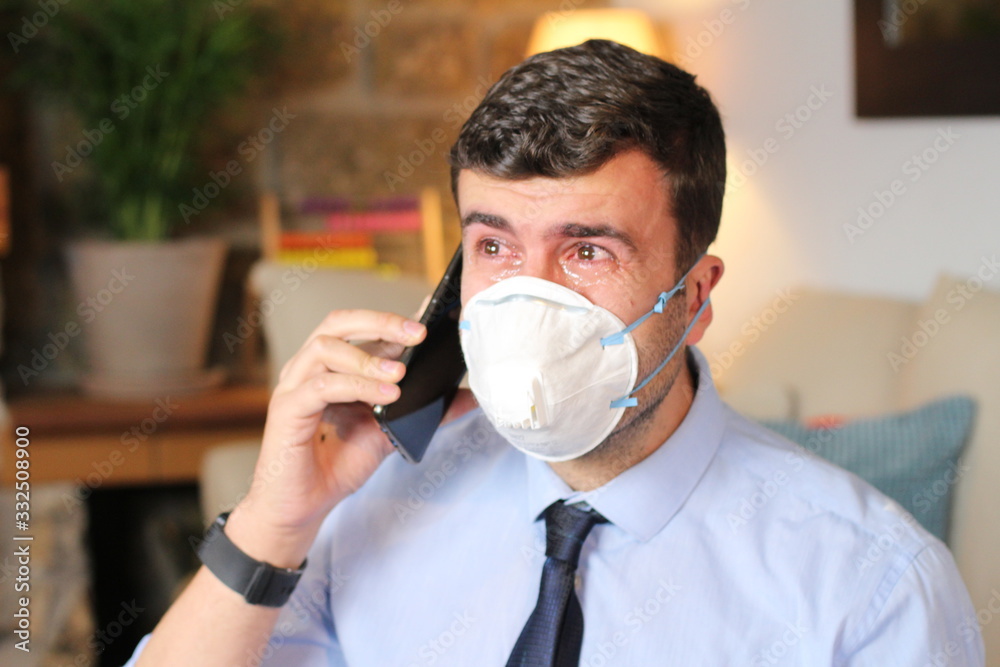 Businessman crying during viral outbreak recession 